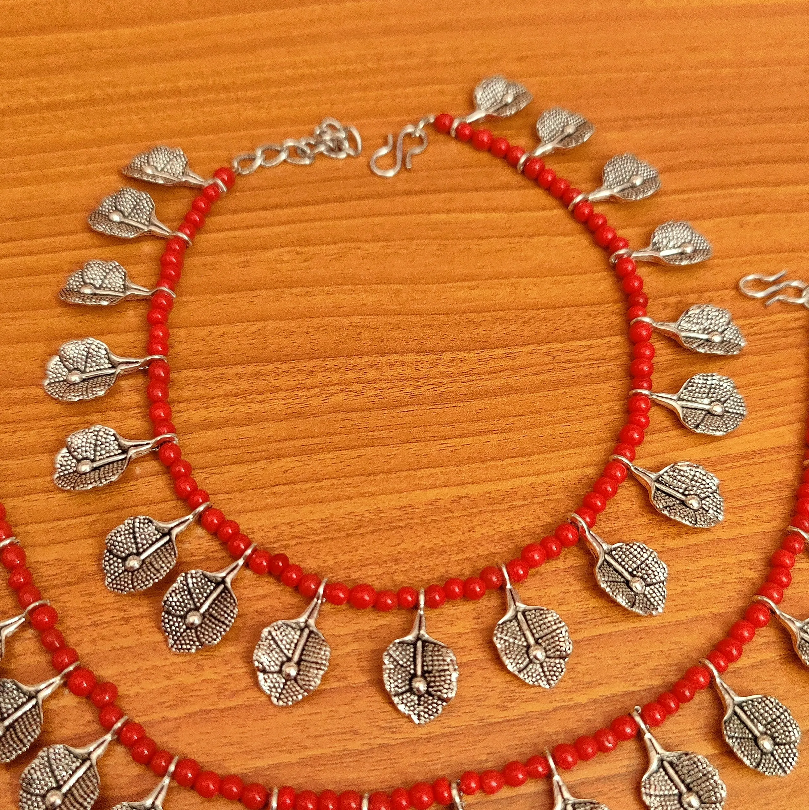 CORAL BEADS OXIDISED FLOWER PATTERN ANKLETS
