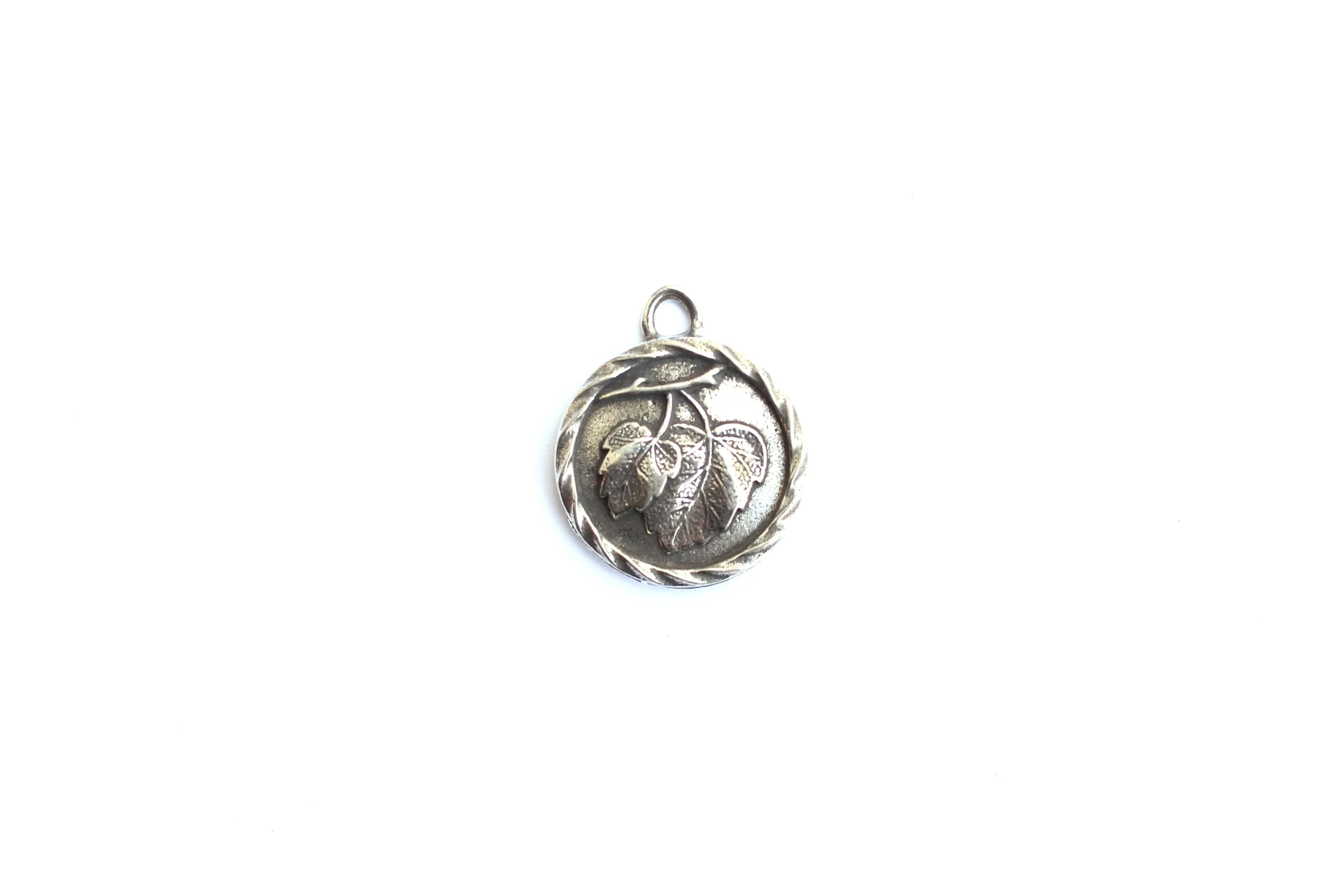 Hazel Leaves Charm in Britannium – Nature's Elegance with Twisted Detail